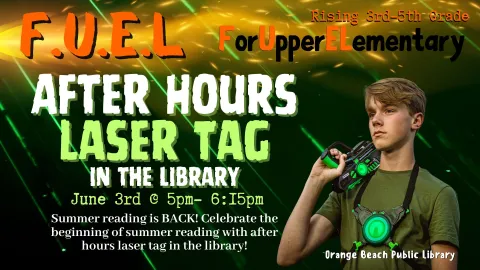 Boy holding green laser tag gun on black background with green lasers and fire.